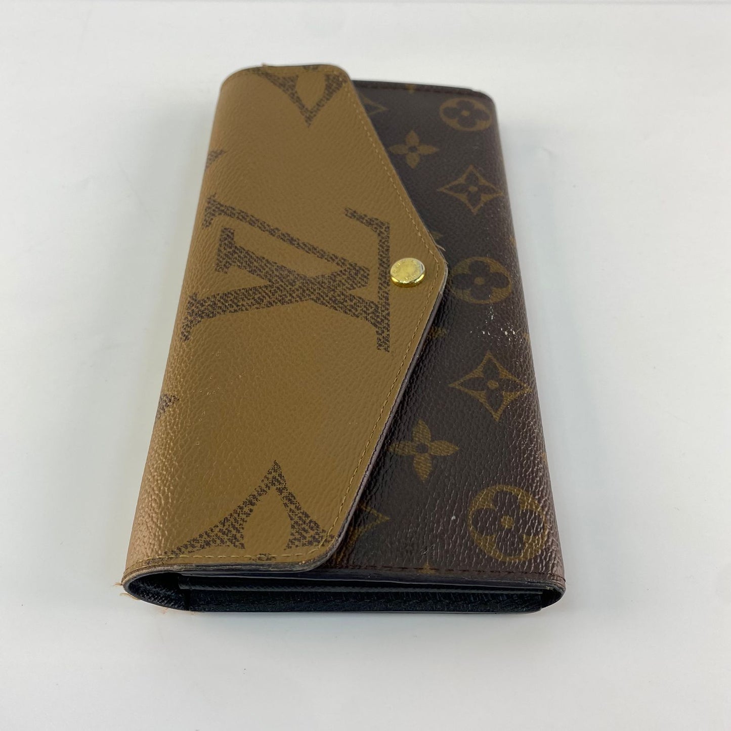 Louis Vuitton	Reverse Monogram Wallet