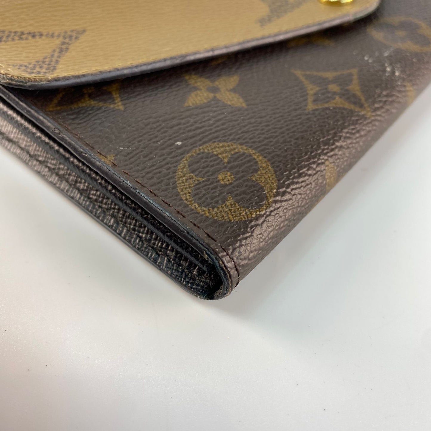 Louis Vuitton	Reverse Monogram Wallet