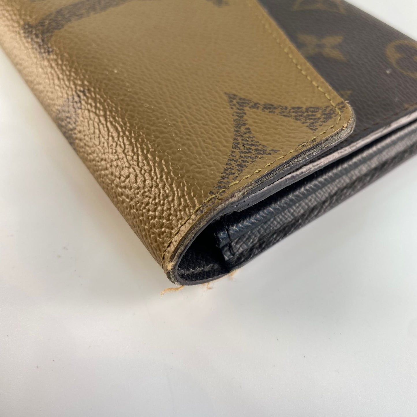 Louis Vuitton	Reverse Monogram Wallet