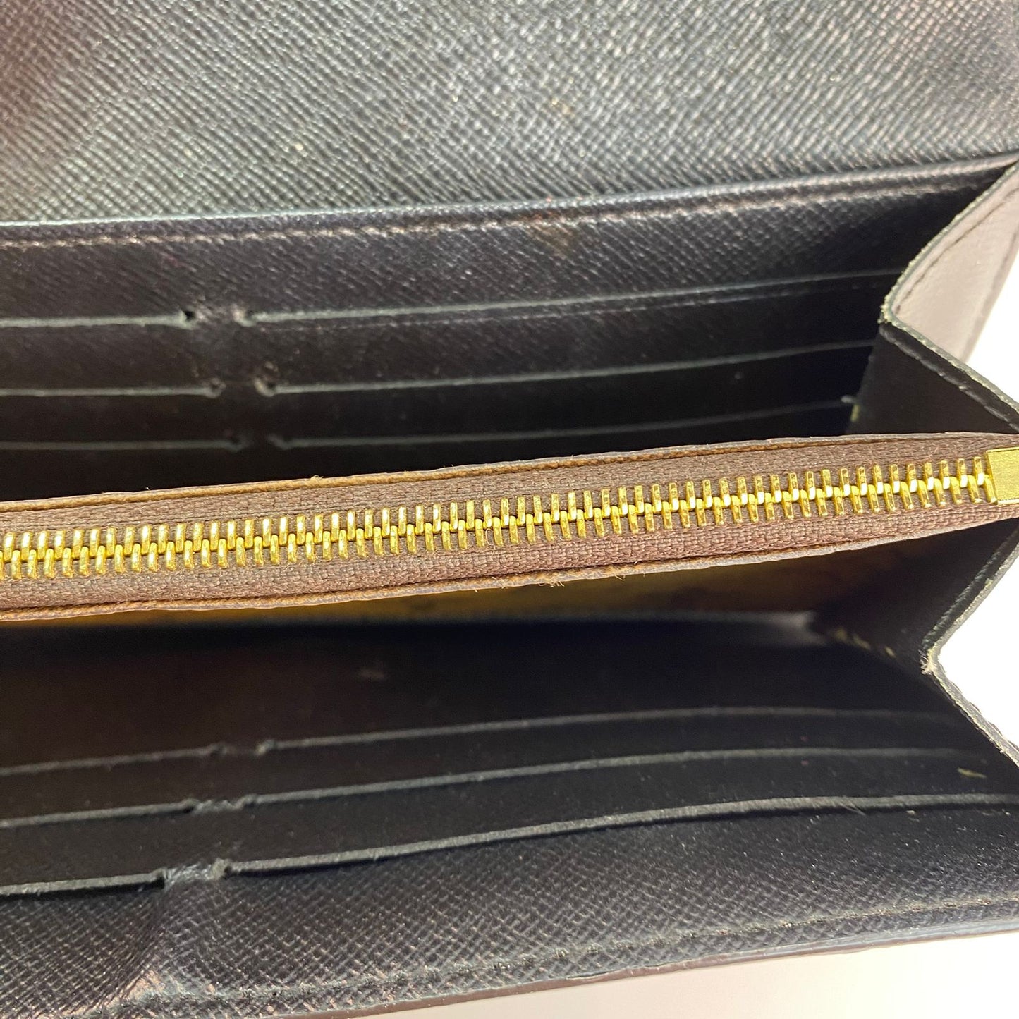 Louis Vuitton	Reverse Monogram Wallet