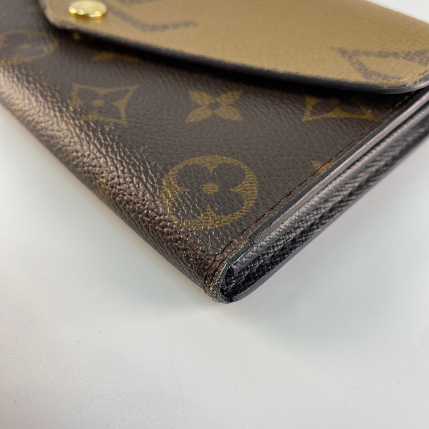 Louis Vuitton	Reverse Monogram Wallet