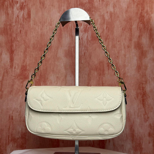 Louis Vuitton	Monogram Empreinte - Ivy White 9.25"L x 4.72"H x 1.69"W