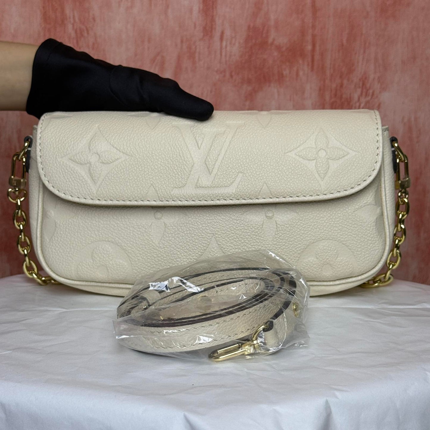 Louis Vuitton	Monogram Empreinte - Ivy White 9.25"L x 4.72"H x 1.69"W