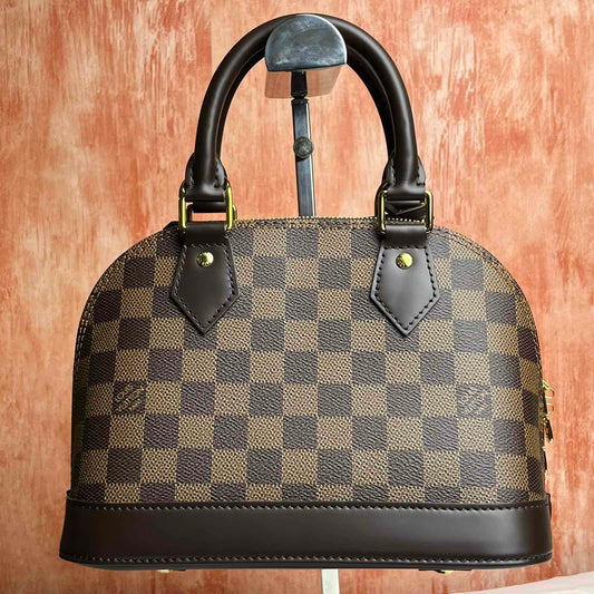 Louis Vuitton	Alma BB Damier Ebene - Brown 9.25"L x 6.89"H x 4.53"W