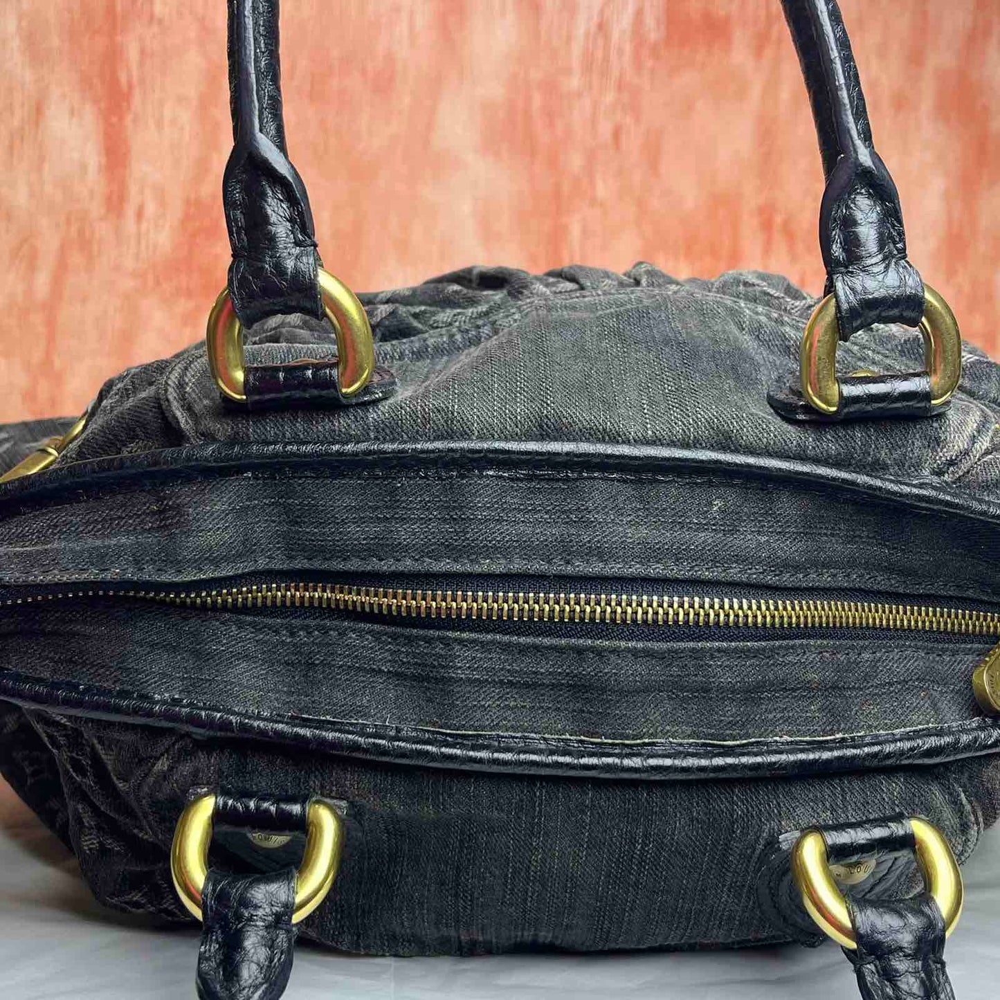 Louis Vuitton	Denim Neo Cabby - Monogram Canvas 9.4"H x 14.2"L x 5.5"W