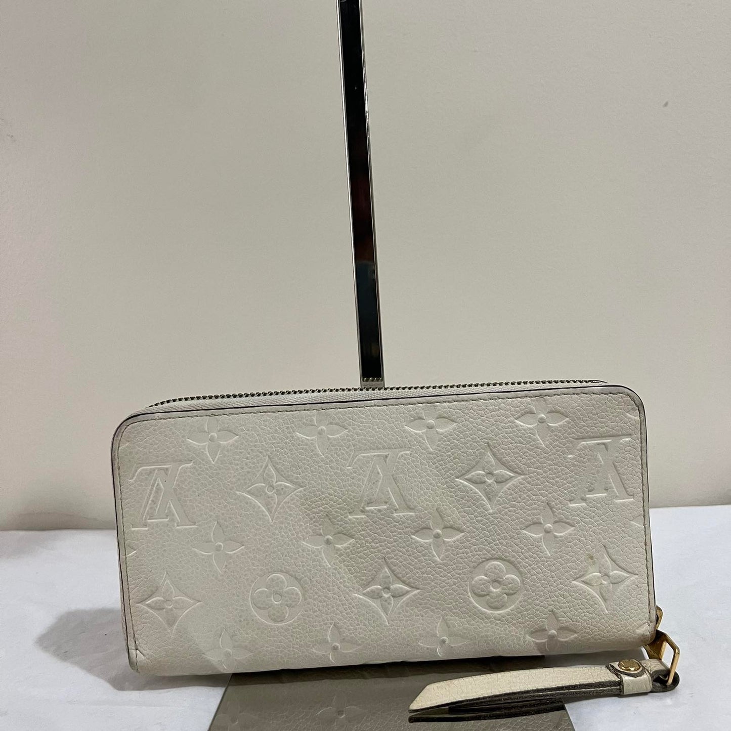 Louis Vuitton Zippy Wallet Empreinte White – 4.1"H x 7.7"L x 1"W