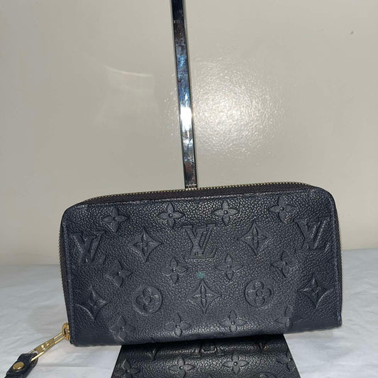 Louis Vuitton Zippy Wallet Empreinte Navy Blue – 4.1"H x 7.7"L x 1"W