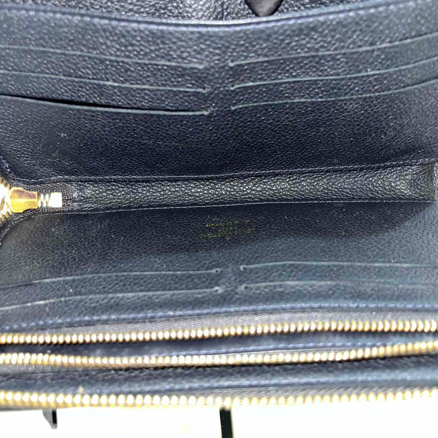 Louis Vuitton Zippy Wallet Empreinte Navy Blue – 4.1"H x 7.7"L x 1"W