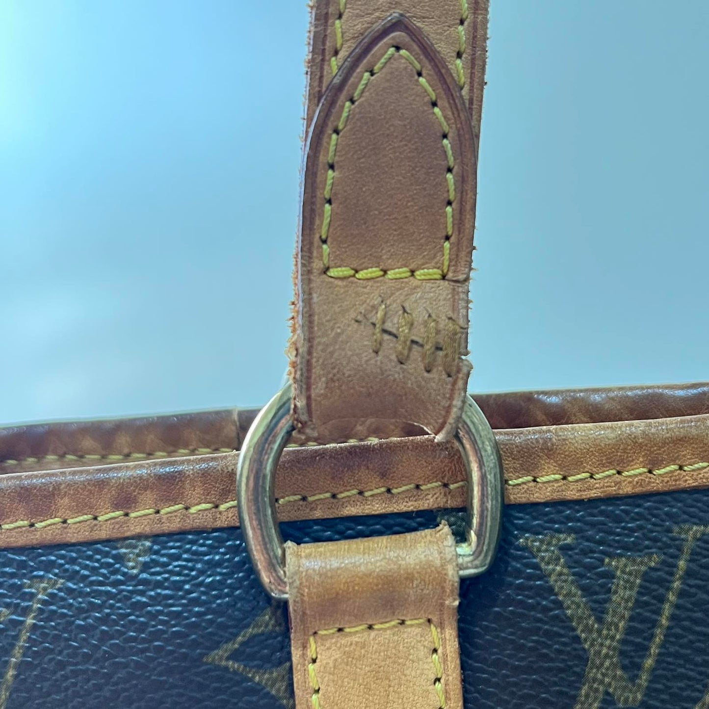 Louis Vuitton Batignolles Vertical Monogram Canvas – 12.2"H x 10.2"L x 5.1"W