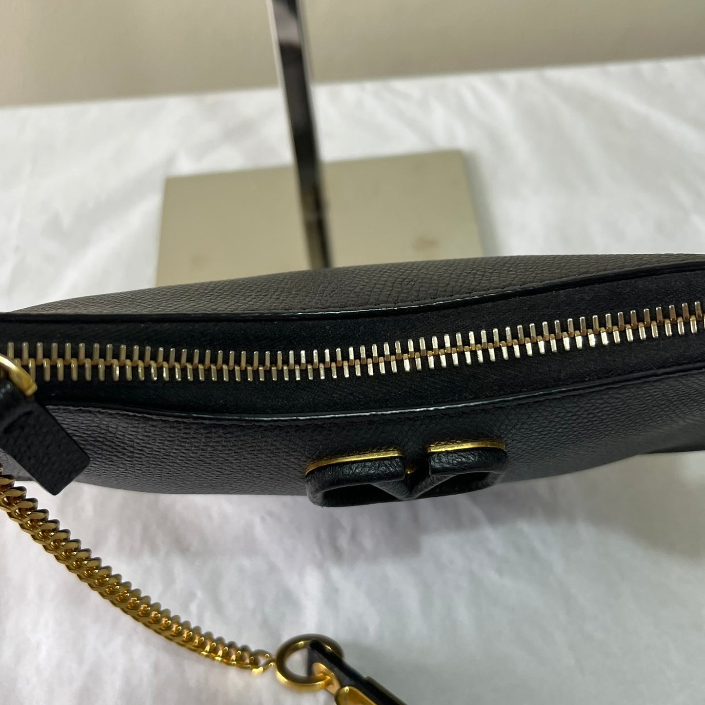 Valentino Garavani Grainy Calfskin Mini Black – 5.5"H x 7.5"L x 2.4"W