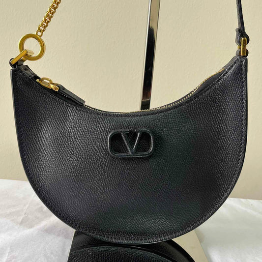 Valentino Garavani Grainy Calfskin Mini Black – 5.5"H x 7.5"L x 2.4"W