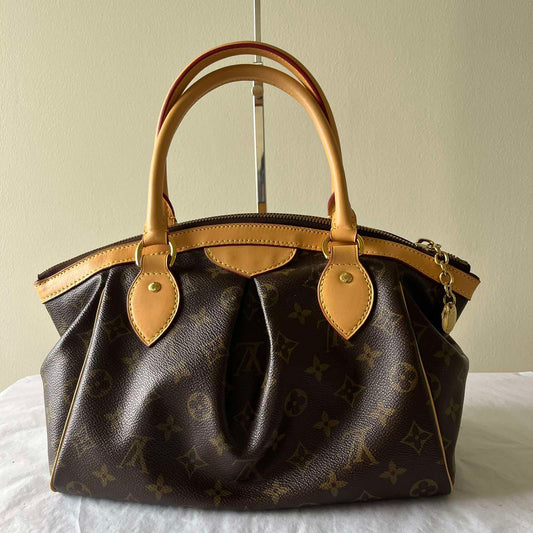 Louis Vuitton Tivoli PM Monogram Canvas – 8.3"H x 11.8"L x 5.5"W