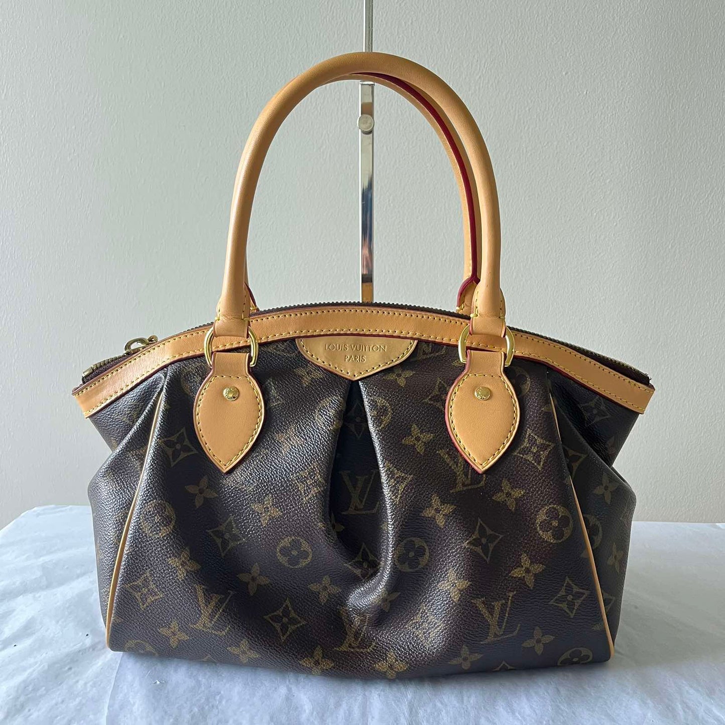 Louis Vuitton Tivoli PM Monogram Canvas – 8.3"H x 11.8"L x 5.5"W