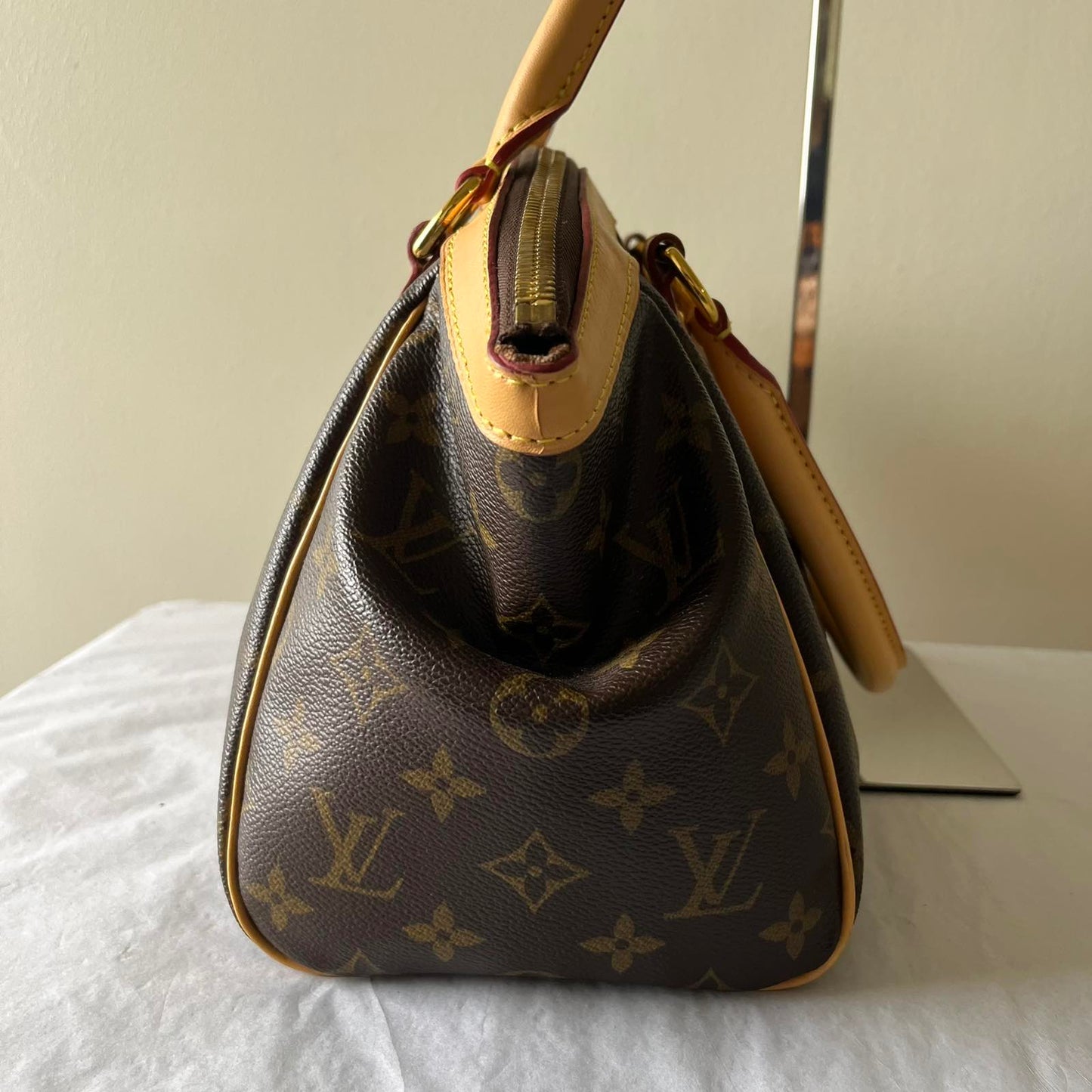 Louis Vuitton Tivoli PM Monogram Canvas – 8.3"H x 11.8"L x 5.5"W