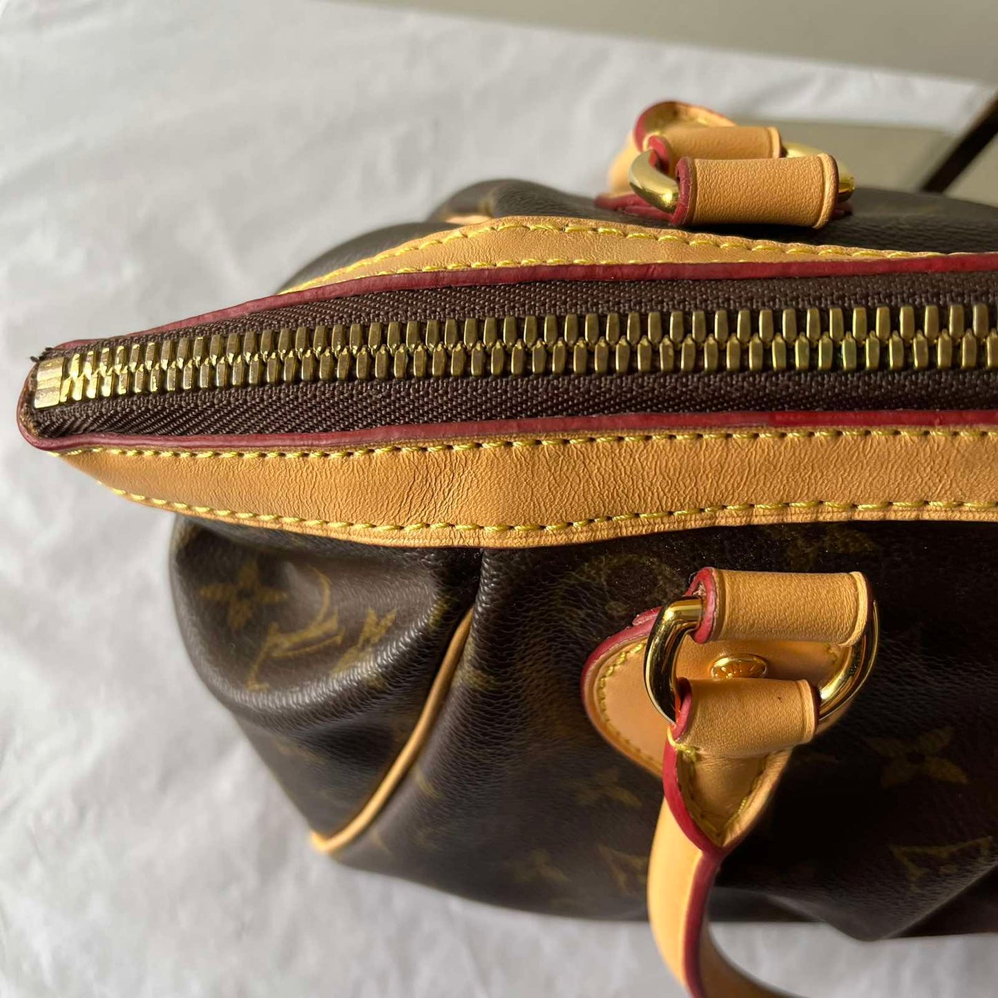 Louis Vuitton Tivoli PM Monogram Canvas – 8.3"H x 11.8"L x 5.5"W