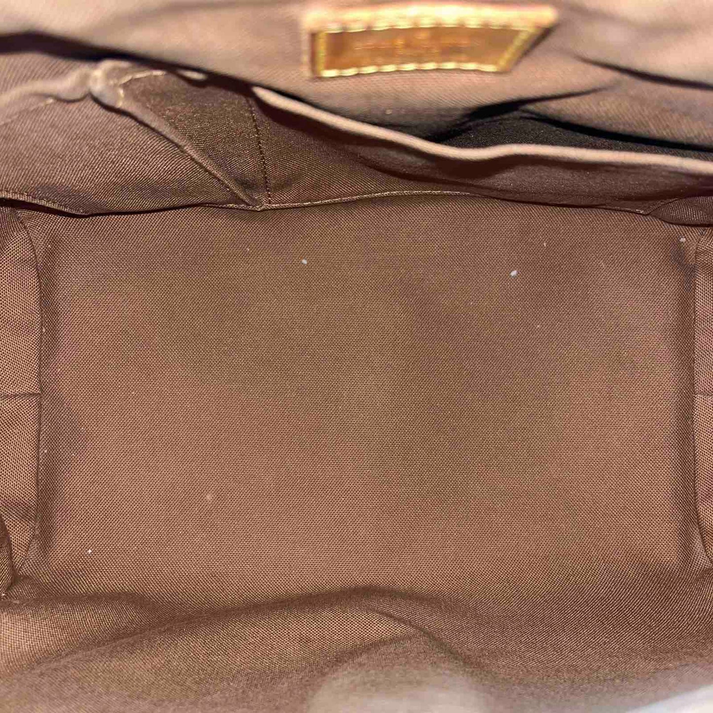 Louis Vuitton Tivoli PM Monogram Canvas – 8.3"H x 11.8"L x 5.5"W